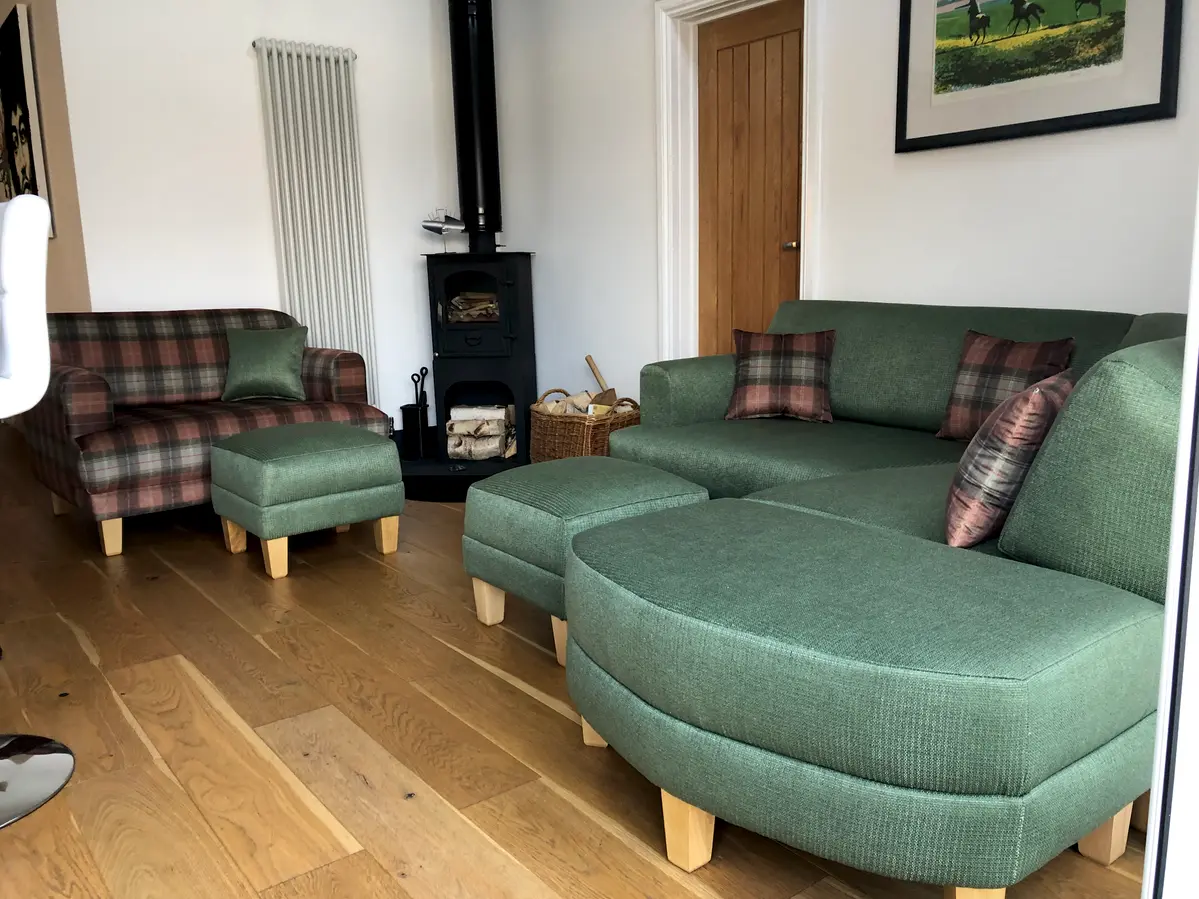 Bespoke green L-shaped corner sofa with matching footstools and tartan check loveseat, handmade by Ralvern Upholstery